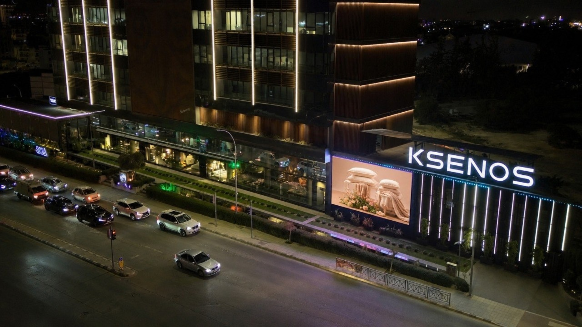 Ksenos Billboard at night in Limassol